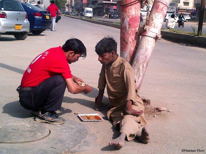 homeless man being fed
