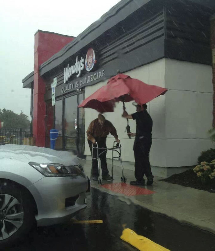 elderly man in rain